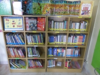 Students reading colour-coded library books during a reading period
