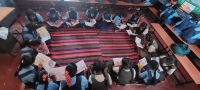 Girls in a government school in Tamil Nadu reading books during a library session