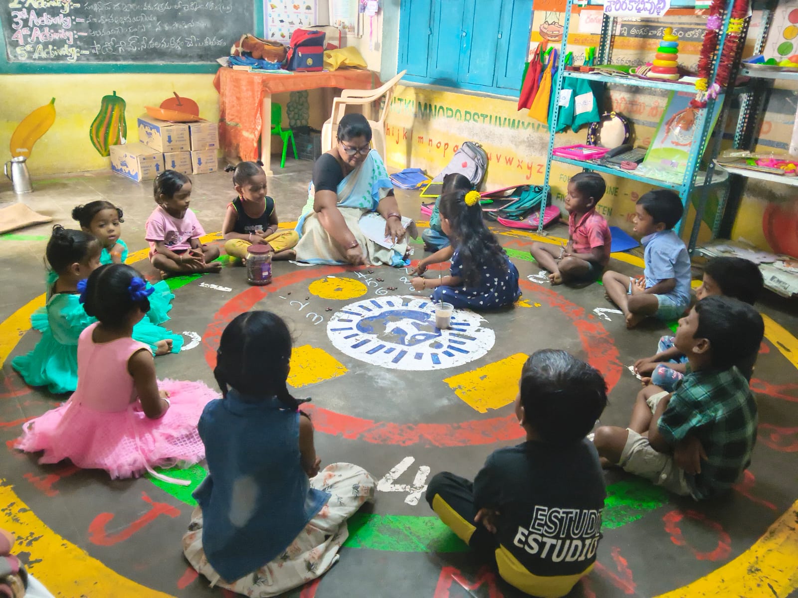 Anganwadi children engaged in play-based learning activities