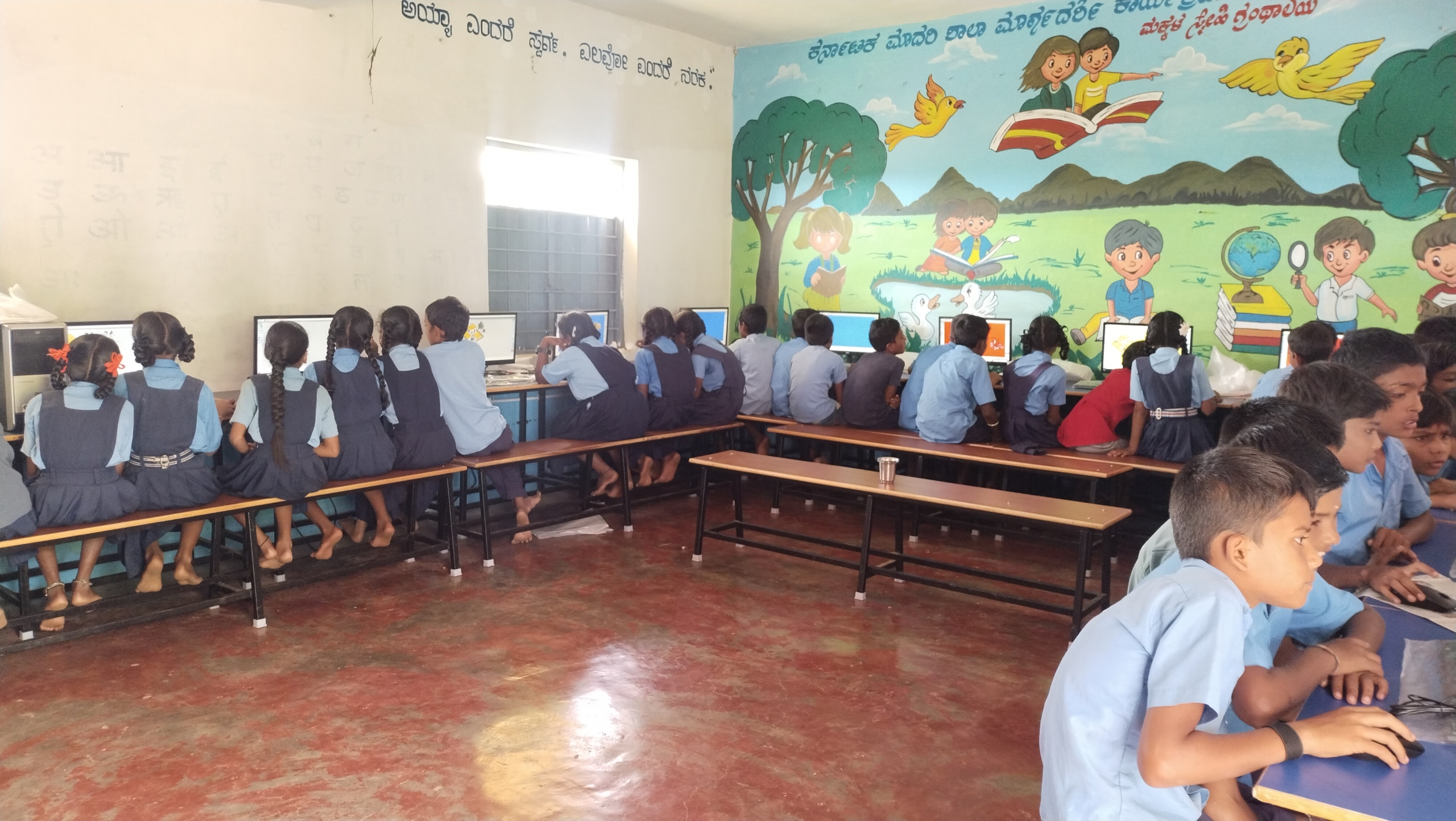 Students at computer workstations in a TALP ICT lab, Kalyana Karnataka