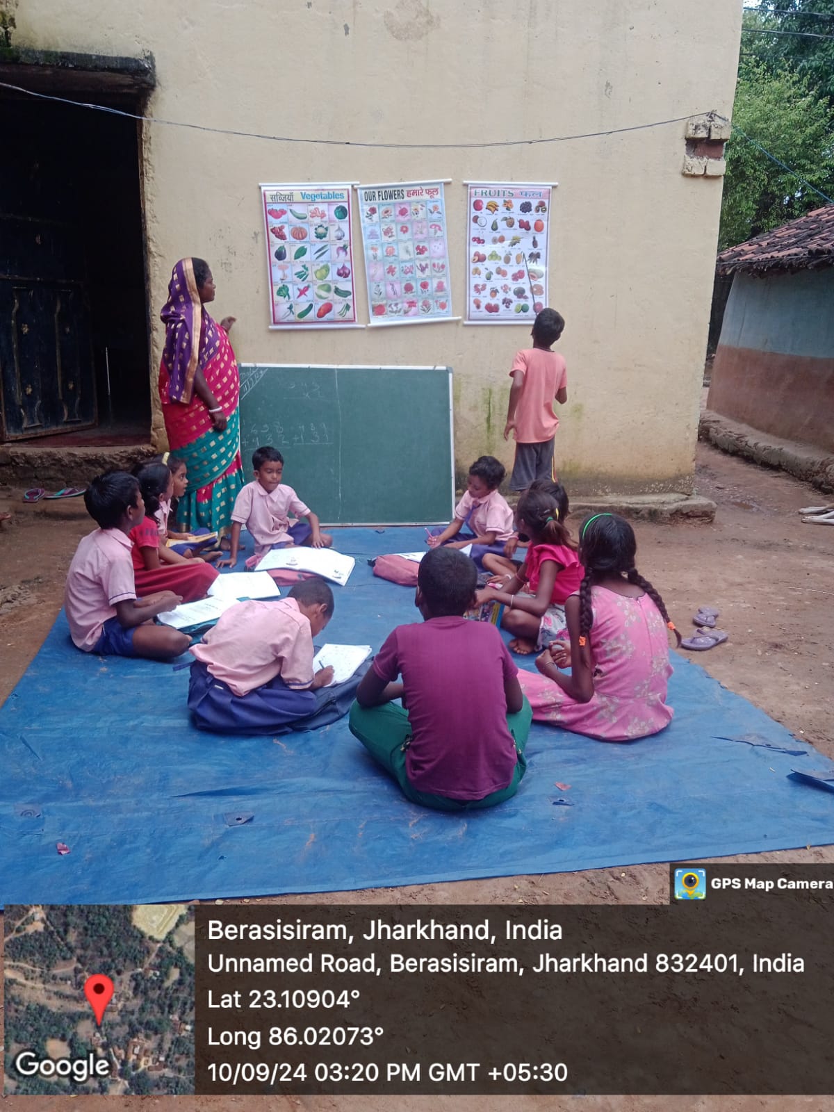 A Vidya Saathi with children at a Village Learning Center