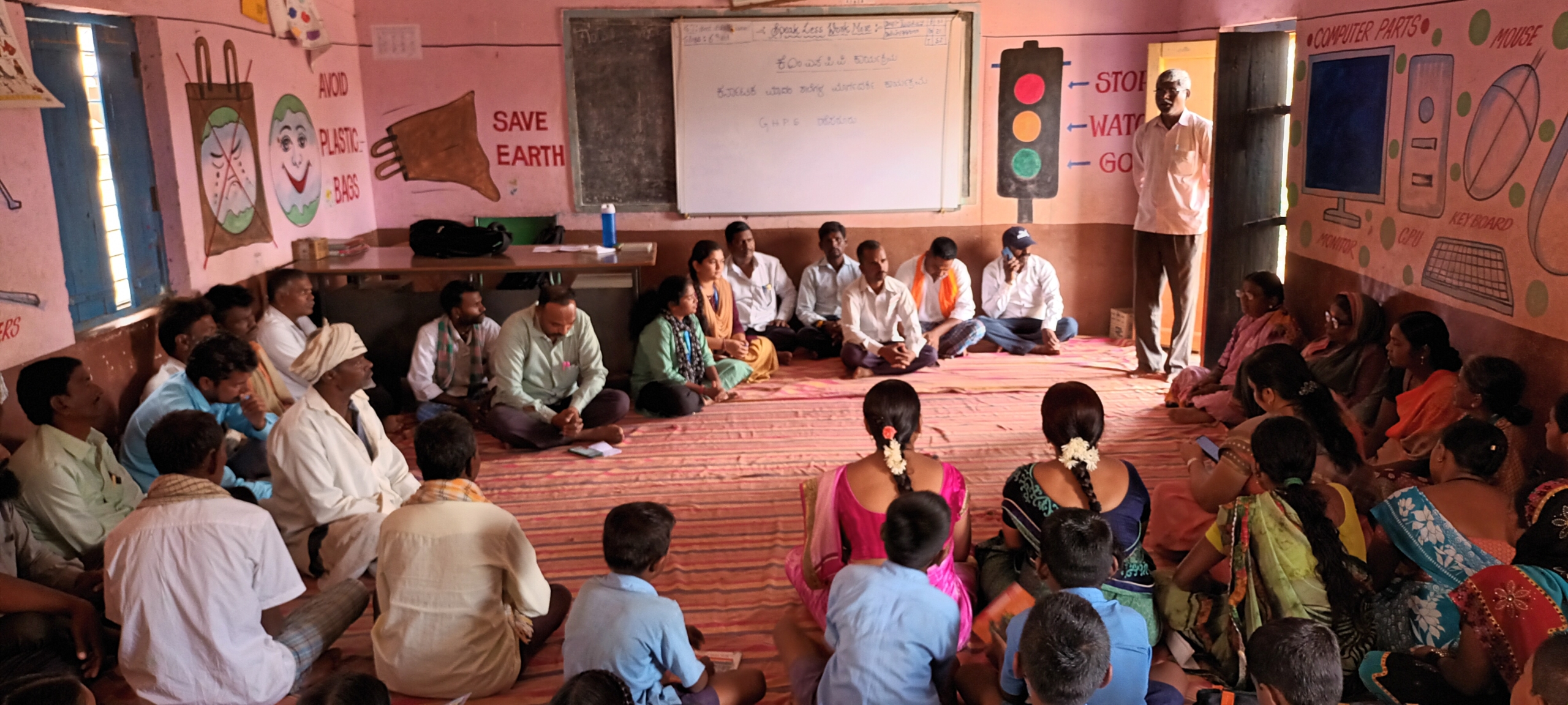 A School Development and Monitoring Committee meeting with parents
